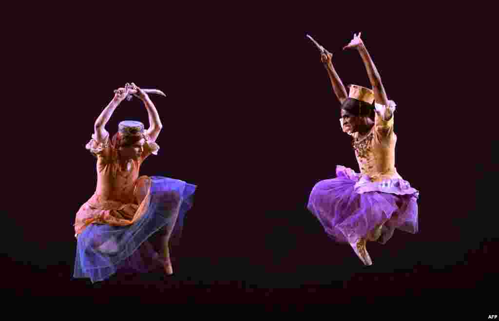 Dancers from Les Ballets Trockadero de Monte Carlo perform a scence from &quot;Trovatiara&quot; during a dress rehearsal before opening night at the Joyce Theater in New York.