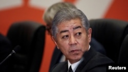 FILE - Japanese Foreign Minister Takeshi Iwaya look on during a meeting with U.S. Secretary of State Antony Blinken during the Asia-Pacific Economic Cooperation (APEC) summit, in Lima, Peru, Nov. 14, 2024. 