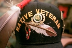 The decorated hat of an American Indian veteran appears at the Edith Nourse Rogers Memorial Veterans Hospital, in Bedford, Mass., Tuesday, Nov. 13, 2007.