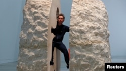 French artist Abraham Poincheval poses inside his artwork Pierre ("Stone") in Paris, France, Feb. 22, 2017, before entering the rock as part of his project to live inside for a week. 