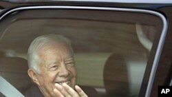 Former President Jimmy Carter leaves MetroHealth Hospital in Cleveland, 30 Sep 2010