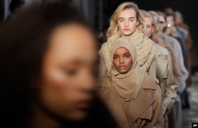 Somali-American model Halima Aden wears a creation part of the Max Mara women's Fall-Winter 2017-18 collection, that was presented in Milan, Italy, Feb. 23, 2017.