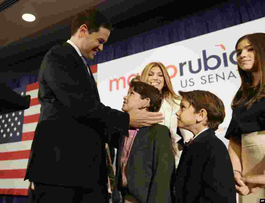 Florida Republican Sen. Marco Rubio smiles at his family after winning a second term in office, Nov. 8, 2016. Rubio defeated U.S. Rep. Patrick Murphy, a two-term congressman. 