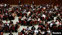 FILE - A general view during the First General Congregation of the Synod at the Paul VI Hall at the Vatican, October 4, 2023.