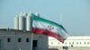 An Iranian flag in Iran's Bushehr nuclear power plant, during an official ceremony to kick-start works on a second reactor at the facility, November 10, 2019. (Atta Kenare/AFP)