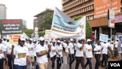 Government officials participate in the anti-corruption walk in Kampala, Uganda, Dec. 4, 2019. (Halima Athumani/VOA News)