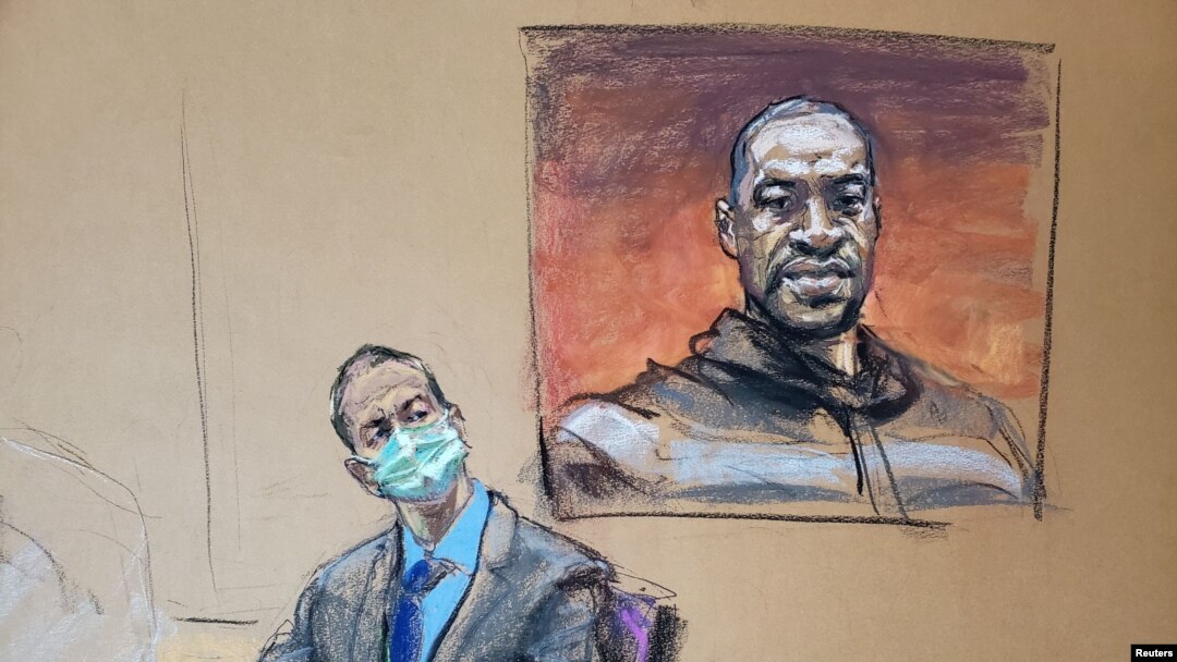El ex oficial de policía de Minneapolis, Dereck Chauvin, se sienta delante de una imagen de George Floyd, el hombre que murió después de ser detenido por este mismo ex agente.