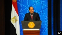 FILE - Egyptian President Abdel-Fattah el-Sissi speaks to Azhar clerics and top government officials in Cairo, Egypt, Dec. 8, 2016. El-Sissi defended the tough economic measures his government has undertaken, saying there was no alternative.