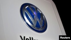 The Volkswagen logo is seen at the company's display during the North American International Auto Show in Detroit, Jan. 10, 2017.