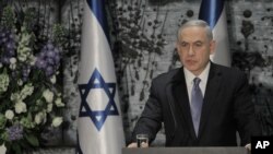 Perdana Menteri Israel Benjamin Netanyahu dalam sebuah upacara di Yerusalem (25/3). (AP/Dan Balilty)