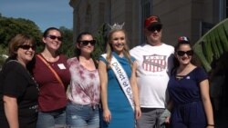 Miss DC 2019 Katelynn Cox posing with visitors at the U.S. Botanic Garden.