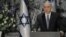 Israeli Prime Minister Benjamin Netanyahu speaks during a ceremony with Israeli President Reuven Rivlin, not shown, in Jerusalem, March 25, 2015.
