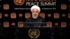 Iran's President Hassan Rouhani addresses the Nelson Mandela Peace Summit in the United Nations General Assembly, at U.N. headquarters, Monday, Sept. 24, 2018.