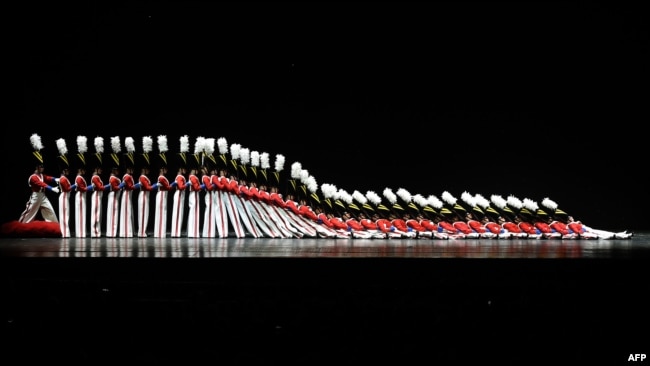 FILE - The Rockettes tumble down in the "Parade of the Wooden Soldiers" during the 2015 Radio City Christmas Spectacular at Radio City Music Hall December 2, 2015. (AFP PHOTO / TIMOTHY A. CLARY)