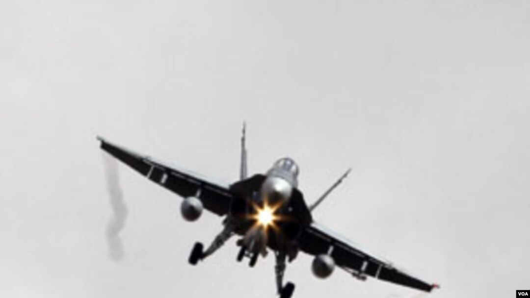 Pesawat militer Kanada CF-18A yang didatangkan untuk ikut serta dalam serangan udara koalisi terhadap Libya.