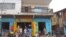 The Arwa clinic, center, that was closed after the clinic Doctor got infected by the Ebola virus in the capital city of Freetown, Sierra Leone, July 15, 2014..