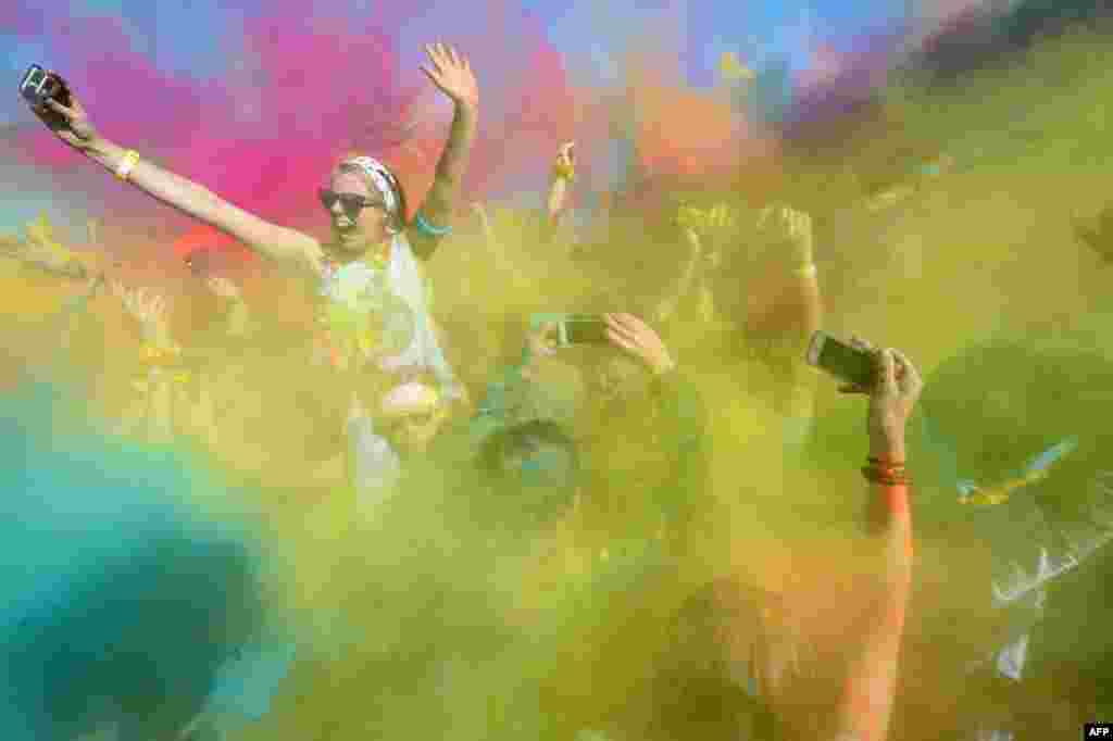 Runners participate in the annual Color Run in Centennial Park in Sydney, Australia.