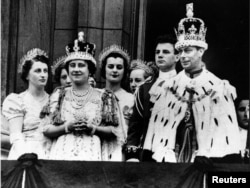 Queen Elizabeth, the Queen Mother, is seen here with King George VI in a photo dated 1937.