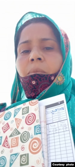 Fozia Kalwar, pictured successful  an undated selfie, says she makes little  than $50 a week vaccinating radical   against polio.