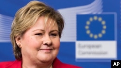 FILE - Norway's Prime Minister Erna Solberg, shown at European Commission headquarters in Brussels in January, says "it's time for a moral reckoning" regarding her country's treatment of its Roma minority.