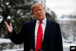 President Donald Trump talks with reporters on the South Lawn of the White House before departing for the American Farm Bureau Federation's 100th Annual Convention in New Orleans, Jan. 14, 2019, in Washington.