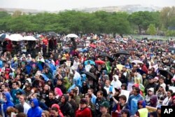 FILE: A crowd gathers for the March for Science in Washington, Saturday, April 22, 2017. Thousands of scientists worldwide left their labs to take to the streets to support science research and funding.