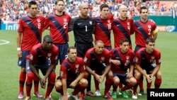 U.S. soccer team pose for a group photo in Washington, June 19, 2011.