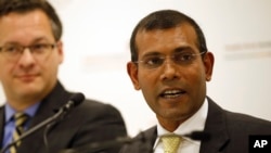 FILE - Former Maldives President Mohamed Nasheed speaks to reporters in London, Jan. 25, 2016. His party said his country's decision to leave the Commonwealth, made without consulting parliament, would damage the Maldives' standing in the international community.