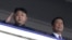 북한 평양에서 지난 7월 한국전 정전 60주년을 맞아 '전승절 기념 열병식'이 열린 가운데, 김정은 국방위원회 제1위원장(왼쪽)과 중국의 특사인 리위안차오 국가부주석이 열병식을 지켜보고 있다.