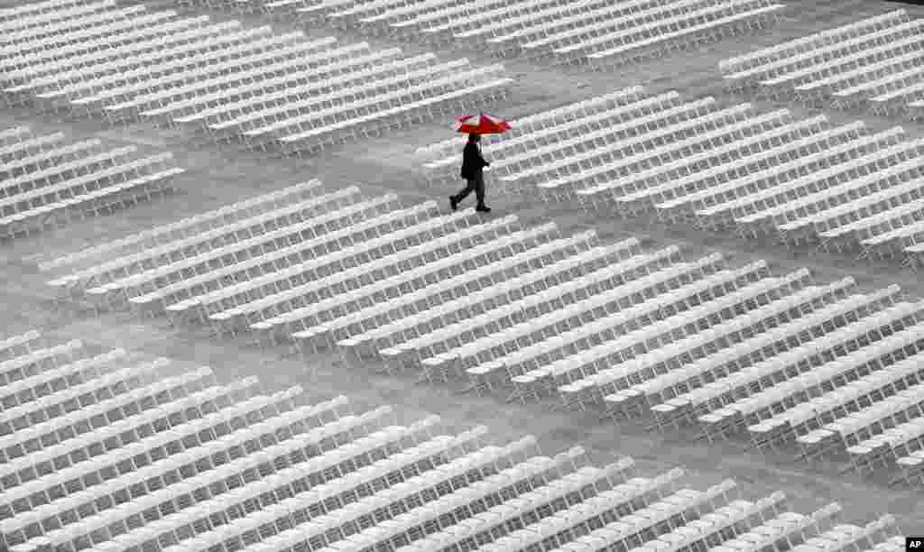 A man walks through Rutgers University&#39;s football stadium before graduation ceremonies in Piscataway, New Jersey, USA.