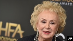 FILE - Doris Roberts arrives at the Hollywood Film Awards at the Beverly Hilton Hotel on Nov. 1, 2015, in Beverly Hills, Calif. 