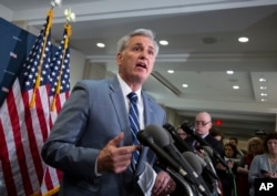 FILE - House Republican Minority Leader Kevin McCarthy of California speaks to reporters at the Capitol in Washington, Jan. 8, 2019.