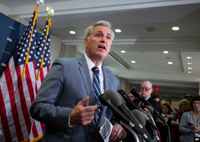 FILE - House Republican Minority Leader Kevin McCarthy of California speaks to reporters at the Capitol in Washington, Jan. 8, 2019.