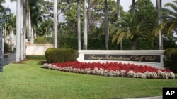 FILE - Signage is seen at Trump International Golf Club, in West Palm Beach, Florida, Feb. 15, 2020.