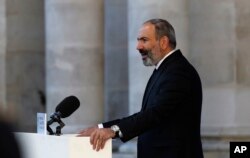 FILE - In this file photo dated Oct. 5, 2018, Armenian Prime Minister Nikol Pashinian delivers a speech in Paris.