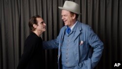 Joaquin Phoenix, left, and John C. Reilly, cast members in the film "The Sisters Brothers," pose together for a portrait at the Adelaide Hotel during the Toronto International Film Festival in Toronto, Sept. 8, 2018 photo . 