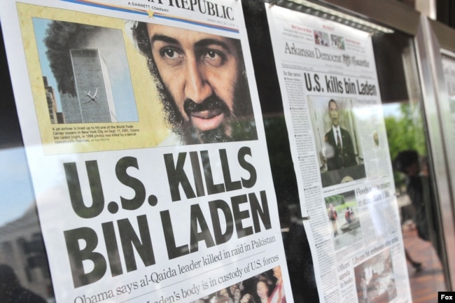 FILE - Front-page headlines that announce the death of al-Qaida terror leader Osama bin Laden are seen at the Newseum in Washington, May 2, 2011.