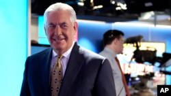 FILE - Secretary of State Rex Tillerson leaves the set following an interview with Chris Wallace, the anchor of "Fox News Sunday," in Washington, Aug. 27, 2017. 