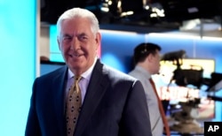 Secretary of State Rex Tillerson leaves the set following a television interview with Chris Wallace, the anchor of FOX News Sunday, in Washington, Aug. 27, 2017.