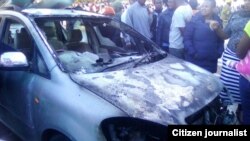 One of the cars burnt down by a blaze that gutted a derelict building in Zimbabwe's second city, Bulawayo.