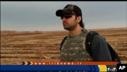 Iranian-American Amir Mirza Hekmati, who has been sentenced to death by Iran's Revolutionary Court on the charge of spying for the CIA, stands in this undated still image taken from video in an undisclosed location made available to Reuters TV, January 9,
