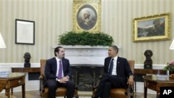 President Barack Obama meets with Lebanese Prime Minister Saad Hariri in the Oval Office of the White House in Washington, 12 Jan 2011