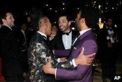 Lena Waithe, from left, Riz Ahmed, and Donald Glover attend the Governors Ball for the 69th Primetime Emmy Awards at the Los Angeles Convention Center on Sunday, Sept. 17, 2017, in Los Angeles. (Photo by Danny Moloshok/Invision for the Television Academy