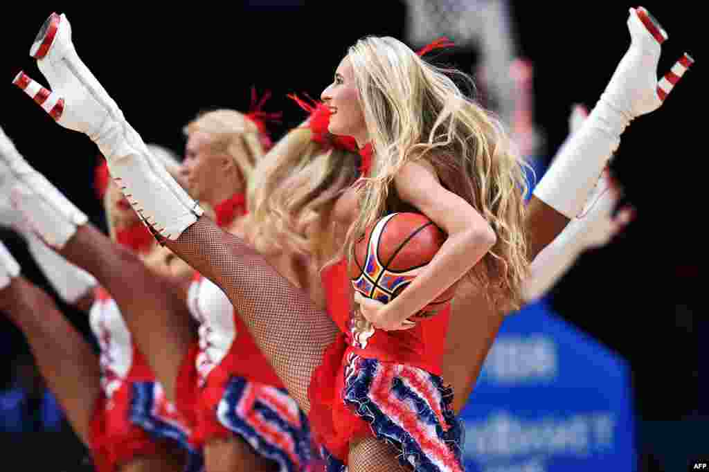 Dancers perform between quarter times during the round of 16 basketball match between Serbia and Finland at the EuroBasket 2015 in Lille, northern France.