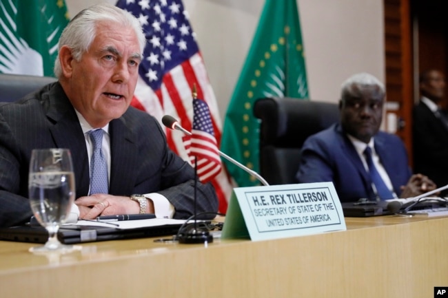 FILE - Tillerson holds a news conference with African Union Commission Chairman Moussa Faki Mahamat after their meeting at AU headquarters in Addis Ababa, Ethiopia, March 8, 2018.
