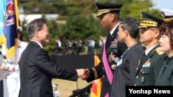 South Korean President Moon Jae-in awarded Vincent Brooks, Commander-in-Chief of ROK-US Combined Forces, during a celebration to mark the 69th anniversary of Korea Armed Forces Day, in Pyeongtaek, South Korea, September 28, 2017.