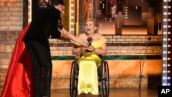 Ali Stroker receives best performance by an actress for her performance in "Rodgers & Hammerstein's Oklahoma!" at the 73rd annual Tony Awards in New York June 9, 2019. (Photo by Charles Sykes/Invision/AP)
