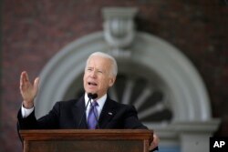 FILE - Former vice president Joe Biden speaks at Harvard University in Cambridge, Massachusetts, May 24, 2017.