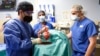 In a First, US Surgeons Transplant Pig Heart into Human Patient 