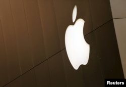 FILE - The Apple logo is seen at the flagship Apple retail store in San Francisco, California April 27, 2015.